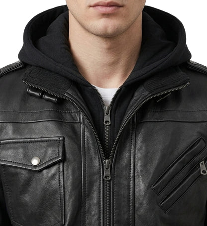 Close-up of a black leather jacket with a hood on a white background